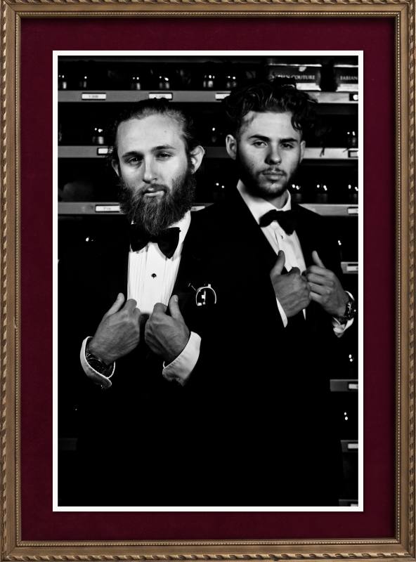 Julian and Miguel Waxman in black tie at the house